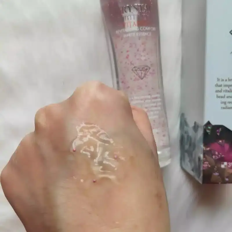 Two 3w Clinic Crystal White Milky Essence bottles, one standing, one showing side packaging details. - thumbnail