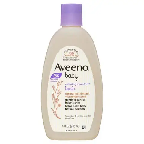 Aveeno Baby Calming Comfort Bath 236ml white bottle with purple lavender label and pump.