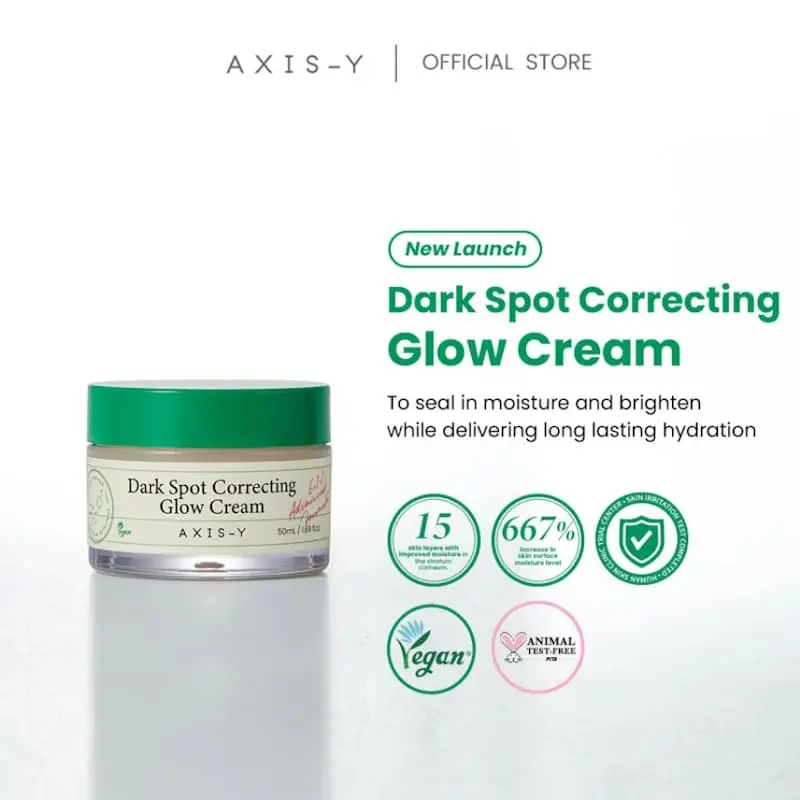 Close-up of Axis-y Dark Spot Correcting Glow Cream's smooth, pearl white texture with the jar. - thumbnail