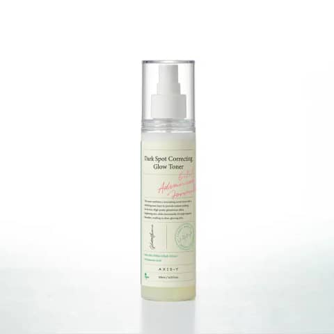 Axis-y Dark Spot Correcting Glow Toner 125ml clear bottle, standing upright on a light surface.