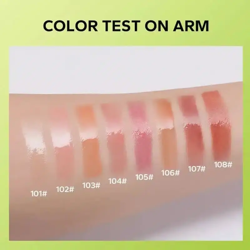 Beauty Glazed Glow Lip Oil Fuse 106 tube, featuring its sleek clear packaging, resting sideways. - thumbnail