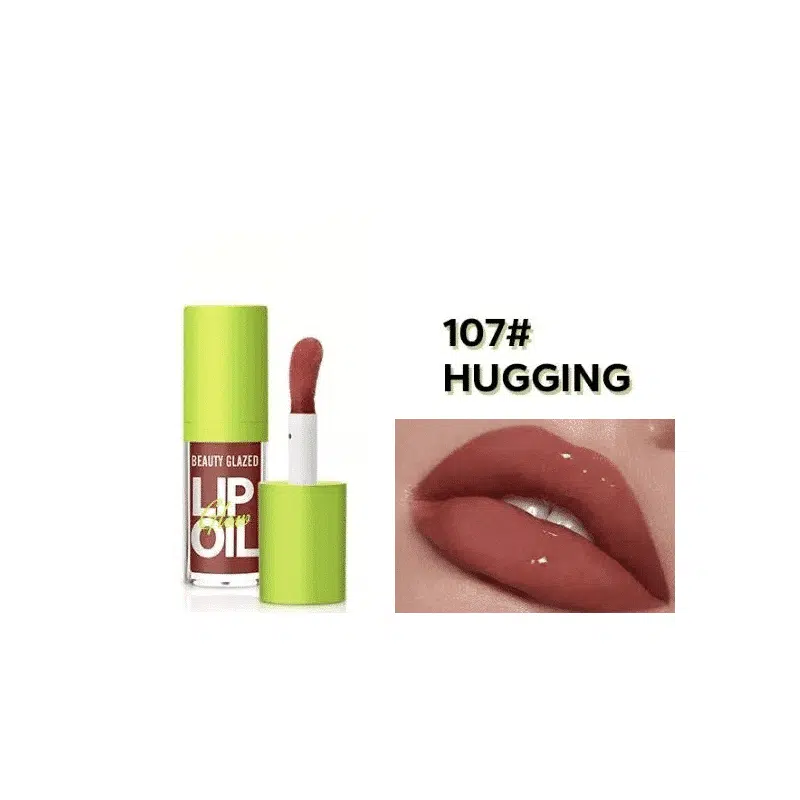 Beauty Glazed Glow Lip Oil Hugging 107 in its clear tube with a silver cap, front view.