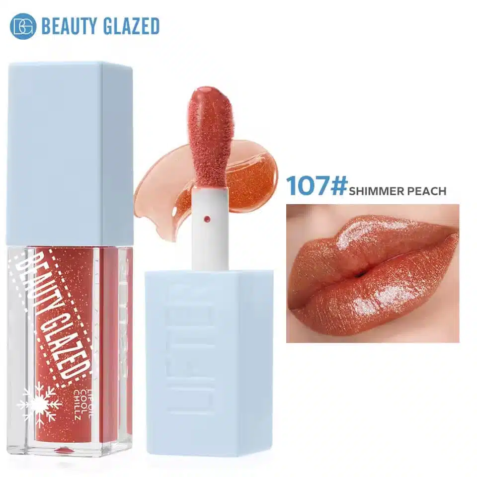 Full Beauty Glazed Lip Oil Cool Chillz 107 in shimmering peach packaging, standing upright. - thumbnail