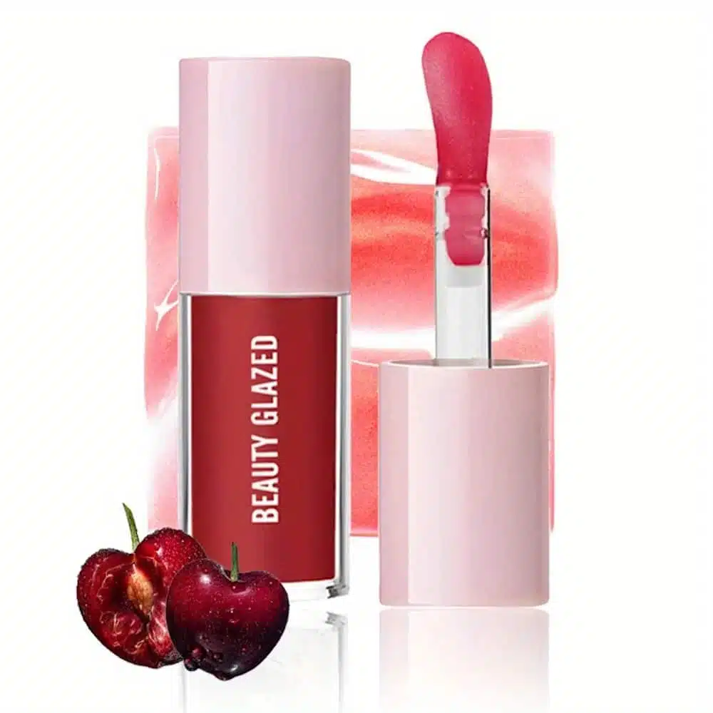 Beauty Glazed Moisturizing Lip Oil 102 in its clear tube, displaying a peachy-pink tint, standing upright. - thumbnail