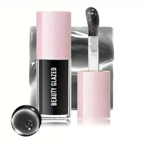 Beauty Glazed Moisturizing Lip Oil 105 in a sleek clear tube, showing glossy pink formula.