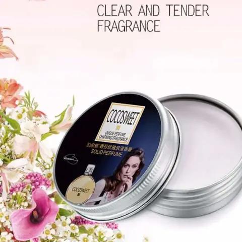 Bioaqua COCOSWEET solid perfume in an open white compact next to its tropical leaf box.