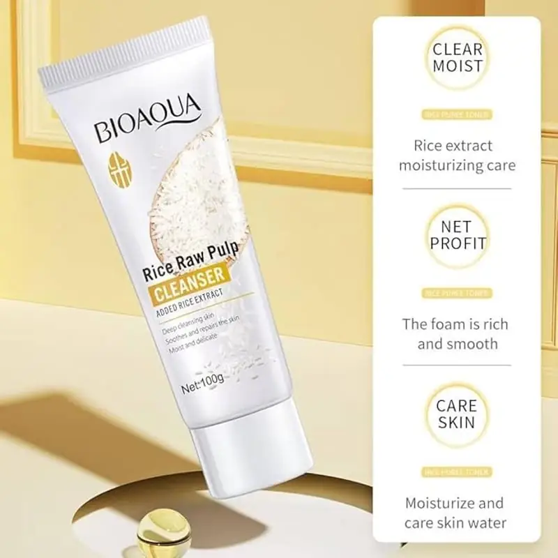 Hand holding the Bioaqua Rice Raw Pulp Cleanser 100ml tube, ready for application. - thumbnail