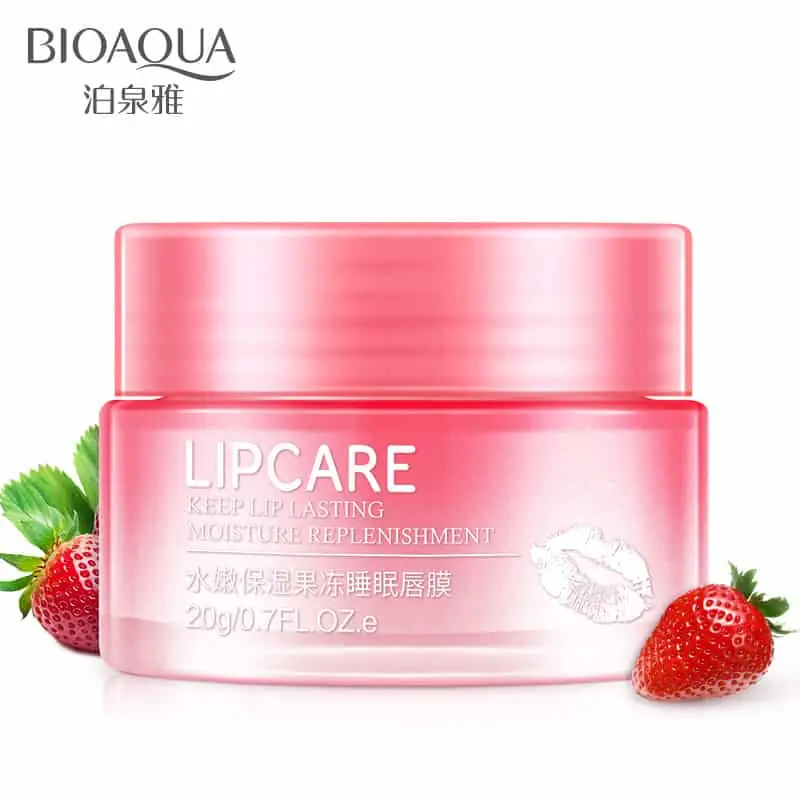 Bioaqua Strawberry Lip Care Sleeping Mask being applied to lips for moisture and shine. - thumbnail