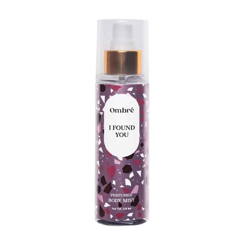 Elegant Body Mist bottles in various pink and purple shades, standing gracefully against a soft, glowing background.