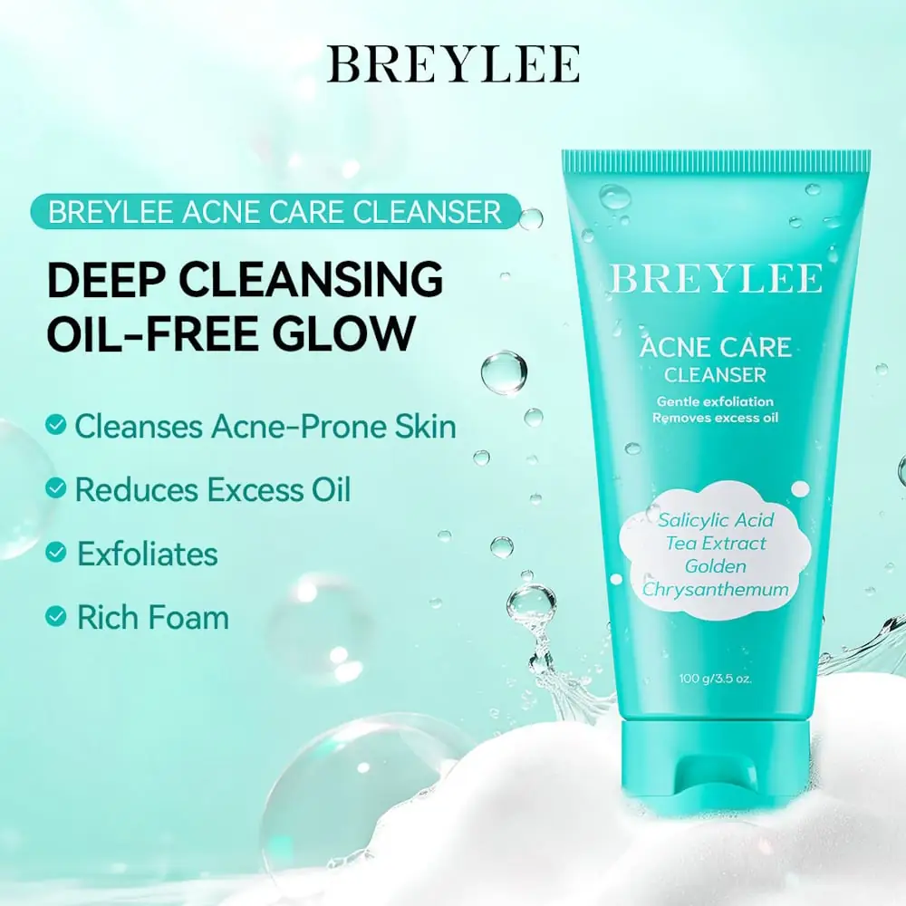Breylee Acne Care Cleanser 100g tube resting beside a luxurious white foamy lather. - thumbnail
