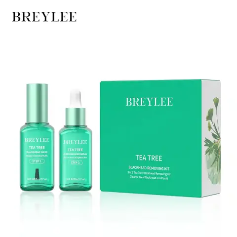 Breylee Tea Tree Blackhead Removing Kit with three green and white bottles, surrounded by leaves.