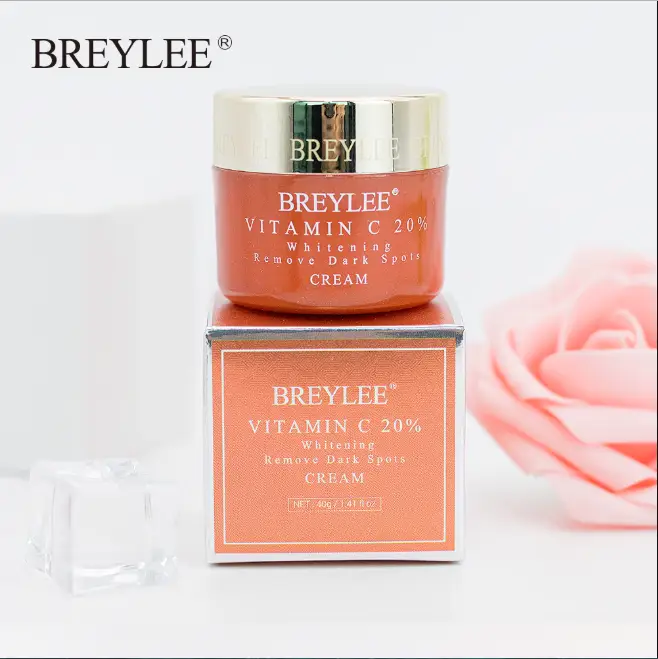 Finger scooping rich white Breylee Vitamin C Whitening Facial Cream from the jar. - thumbnail