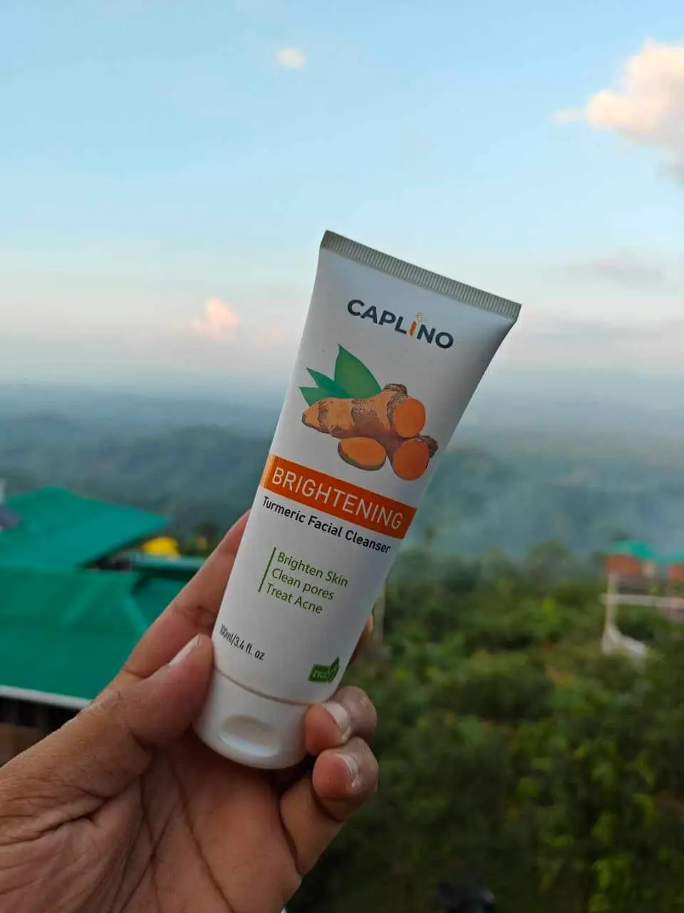 Caplino Pore Solution serum bottle close-up with a clear product drop on a green leaf. - thumbnail