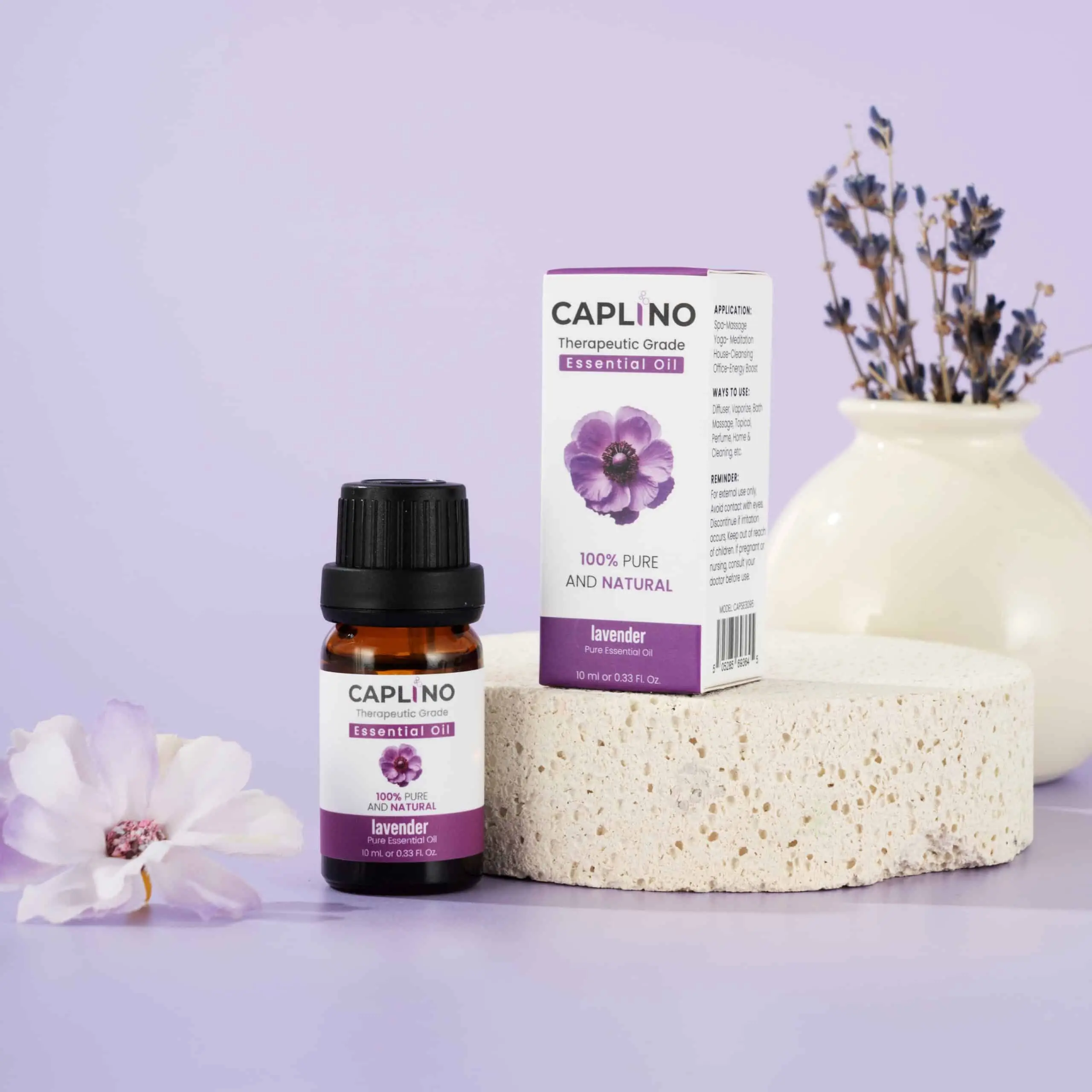 Caplino pure natural lavender essential oil bottle alongside its elegant retail packaging box. - thumbnail