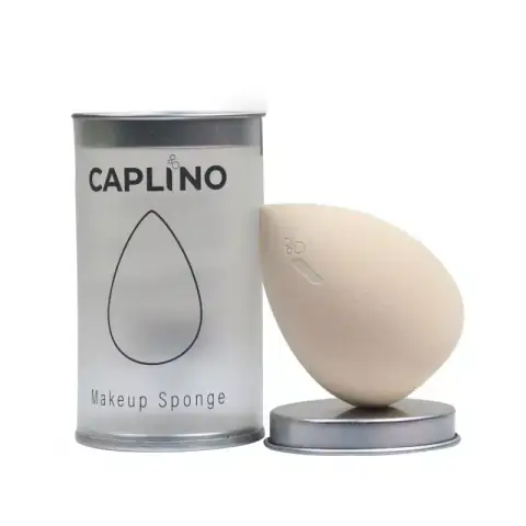 Caplino ash grey makeup sponge, an essential tool for flawless foundation application, standing upright.