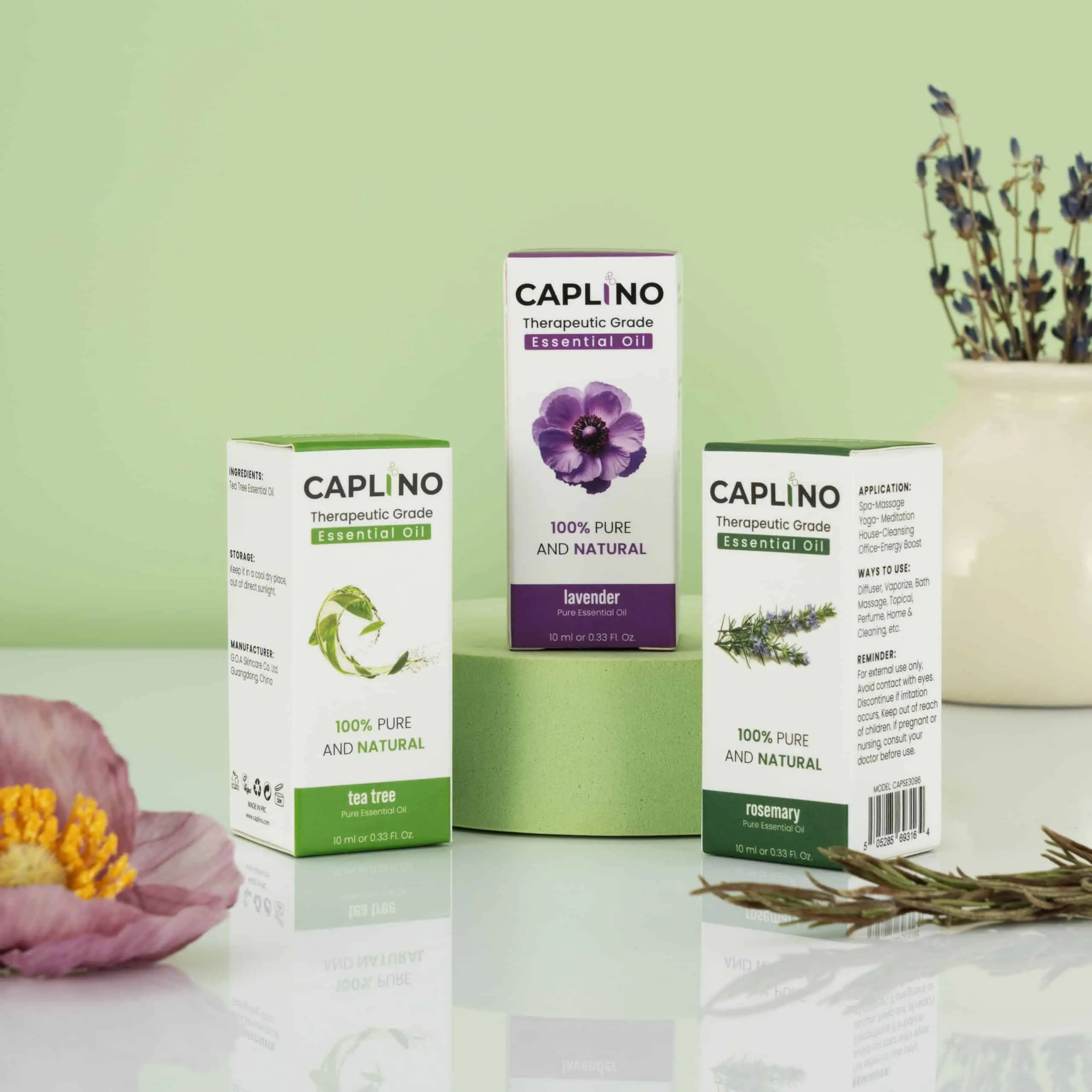 Caplino Rosemary Essential Oil bottle next to fresh green rosemary sprigs, emphasizing natural origin. - thumbnail