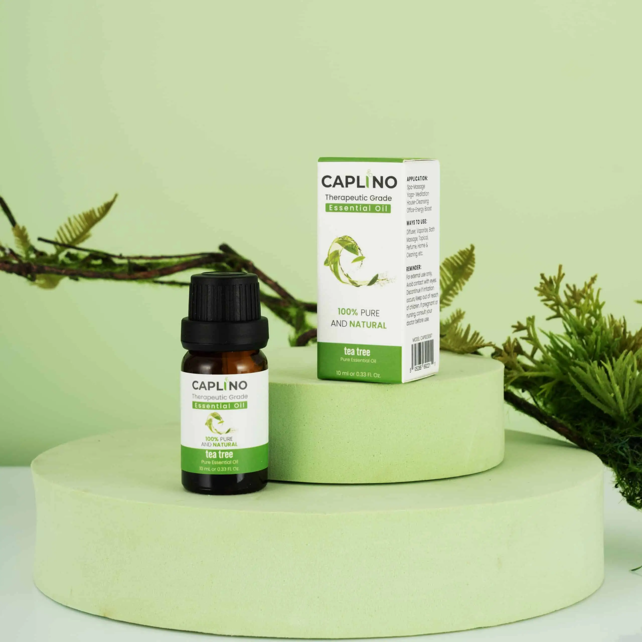 Close-up of Caplino tea tree essential oil amber bottle, highlighting green label details. - thumbnail