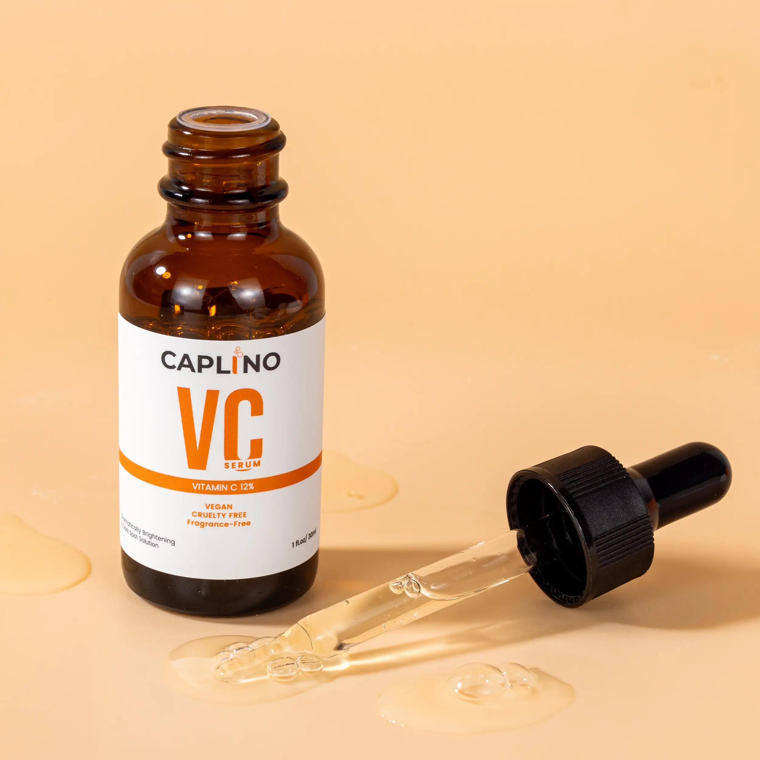Close-up of Caplino Vitamin C Serum 12% bottle label detailing brightening and solution. - thumbnail