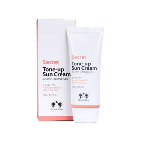 Christian Dean Secret Tone Up Sun Cream 70ml, soft pink tube with white cap, stands on white background.