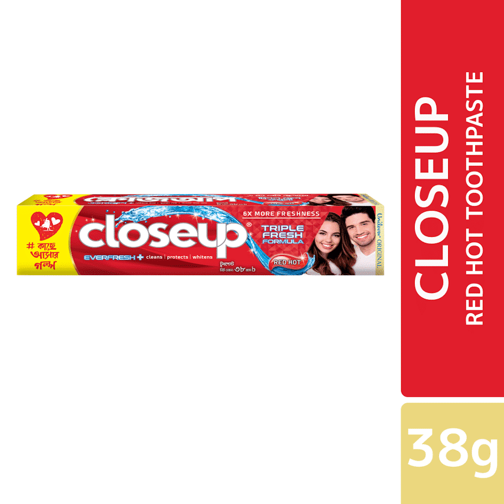 Closeup Red Hot toothpaste tube, 38g, standing upright, featuring its iconic red and white packaging. - thumbnail