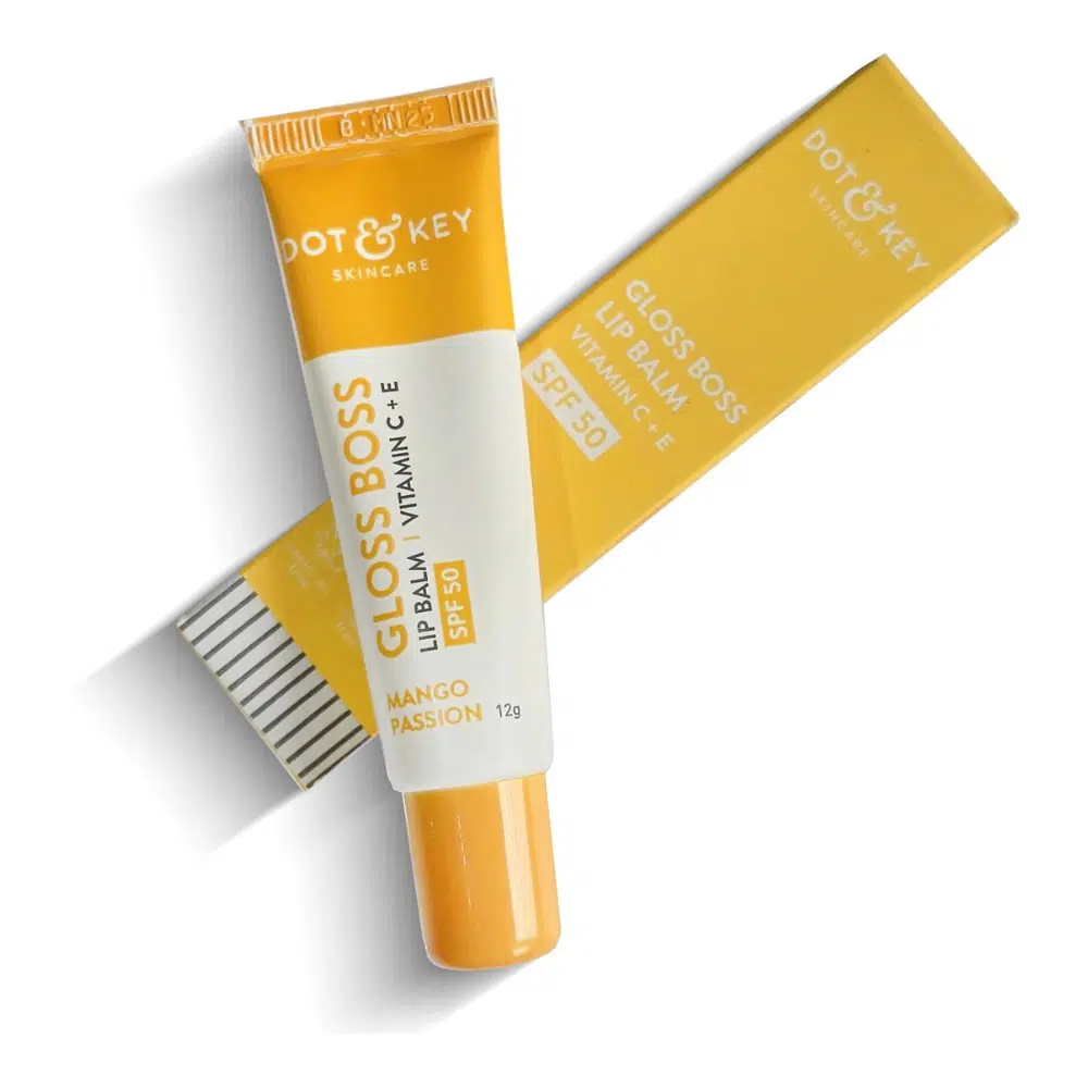 Vibrant orange Dot & Key Gloss Boss Lip Balm tube, Mango Passion variant, SPF 50+.