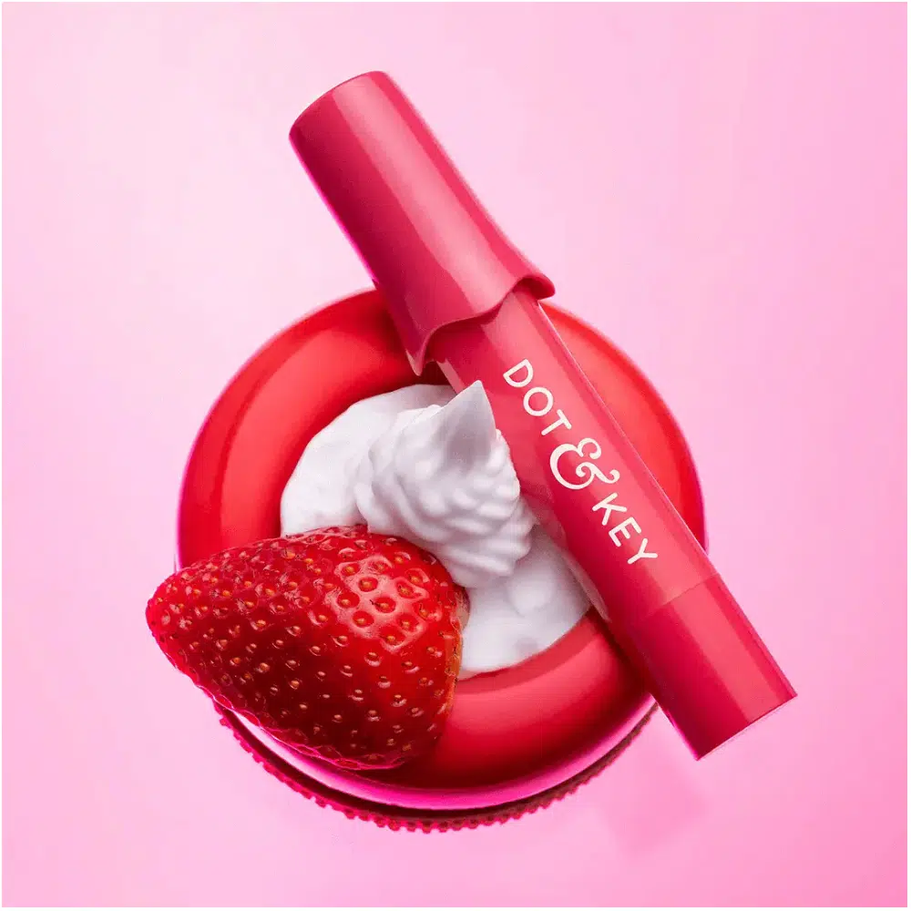 Dot & Key Meltie Lip Balm SPF 50+ Strawberry Glaze in its sleek white and pink tube.