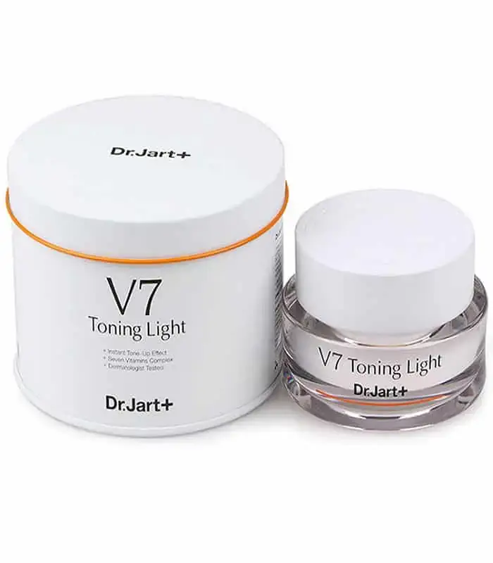 Close-up of open Dr. Jart+ V7 Toning Light jar, revealing smooth white cream texture. - thumbnail