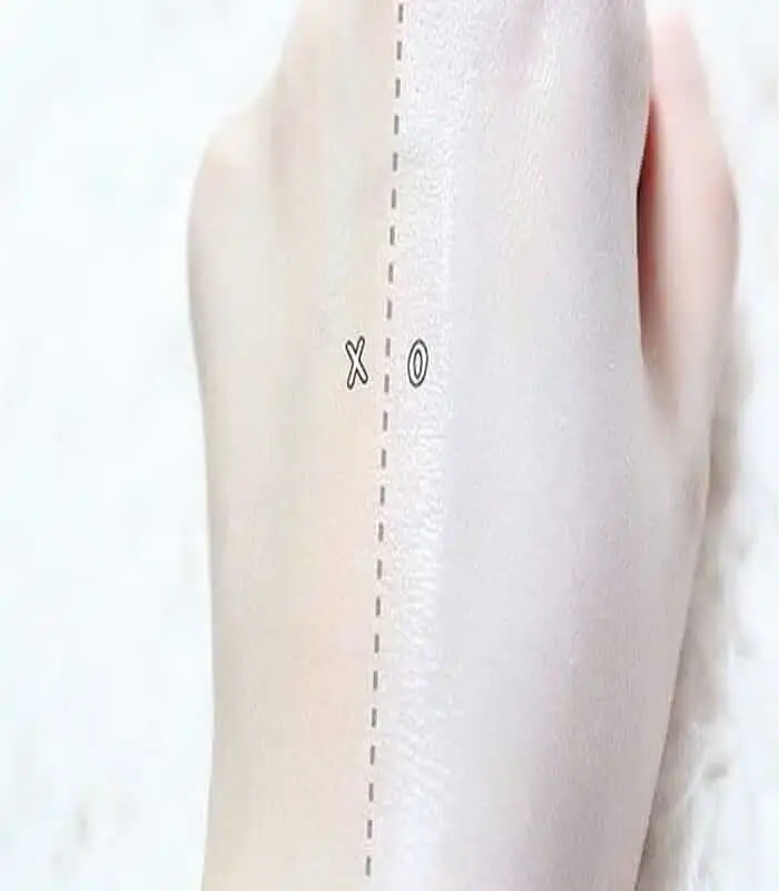 Dr. Jart+ V7 Toning Light cream dollop on a spatula, showing rich white texture. - thumbnail