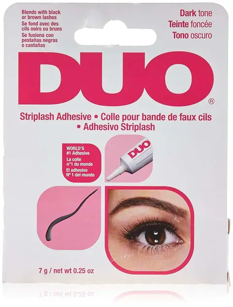 DUO Eyelash Adhesive Clear glue shown in its distinctive white and blue retail box.