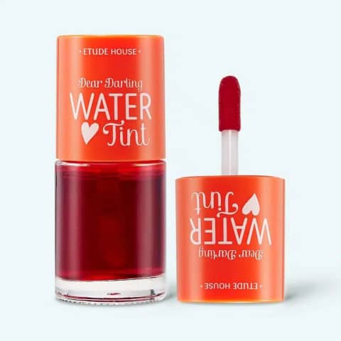 Etude Dear Darling Water Tint #03 Orange in a clear bottle with a white cap, standing upright.