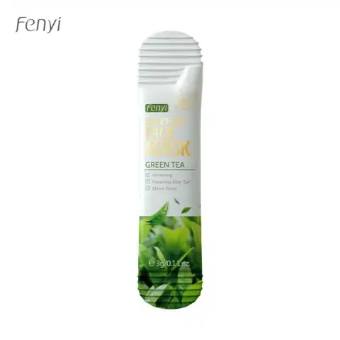 Fenyi Green Tea Sleeping Mask 3gm sachet held, showing front green packaging with tea leaf design.