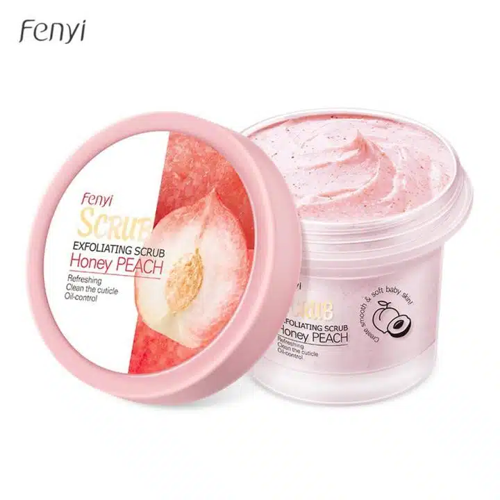 Fenyi Honey Peach exfoliating body scrub in a vibrant pink tube, standing with a fresh peach fruit. - thumbnail