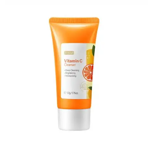 Fenyi Vitamin C Cleanser 50gm tube, vibrant orange and white packaging, standing with fresh citrus slices.
