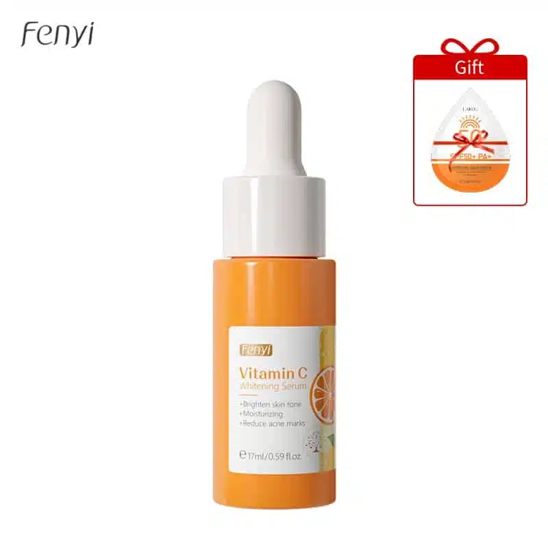 Fenyi Vitamin C Serum 17ml dropper bottle and complimentary sunscreen sachet displayed on white surface. - thumbnail