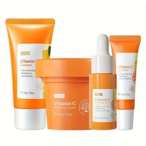 Fenyi Vitamin C Brightening 4-piece set, featuring white and orange bottles displayed together.