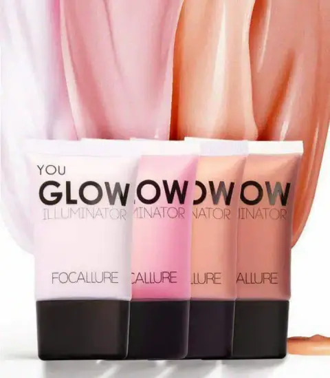 Focallure Glow Illuminator in its sleek rose gold tube with black cap, standing upright.