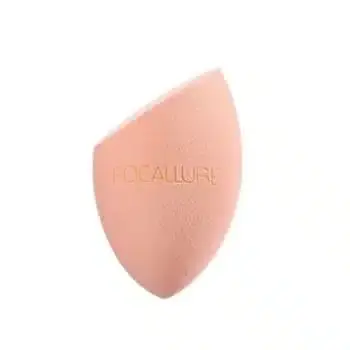 Focallure Match Max pink teardrop makeup sponge, soft texture, with brand logo visible.