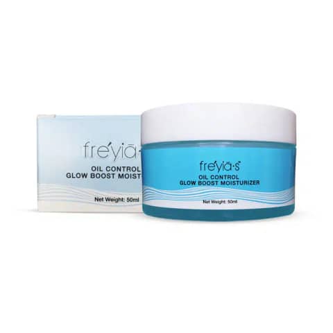 Freyias Oil Control Glow Boost Moisturizer, white tube with mint cap, stands upright showcasing branding.