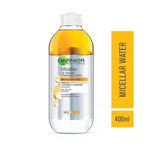 Garnier Micellar Cleansing Water in Oil 400ml, clear bottle with dual golden oil and water layers.
