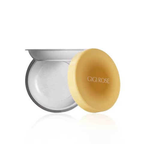 GiGi Rose Translucent Oil-Control Loose Powder in white packaging, front view with rose gold lid.