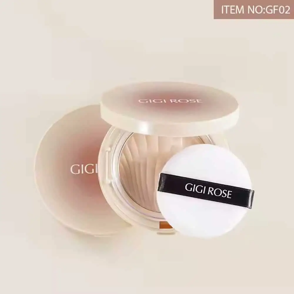 GiGi Rose Nude E03 pressed powder in closed sleek black compact, highlighting brand logo. - thumbnail
