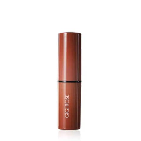 GiGi Rose Full Coverage Stick Concealer 01 in its sleek black tube, cap on, standing upright.