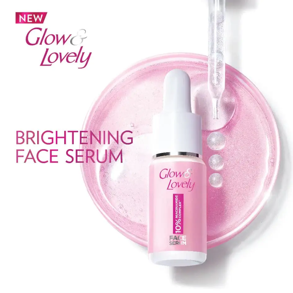 Close-up of Glow & Lovely Brightening Face Serum label, detailed text visible on the bottle. - thumbnail