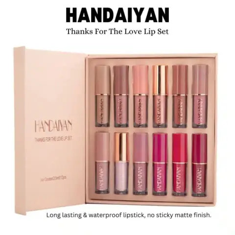 Handaiyan 12 liquid lip colors with metallic gold caps, arranged in its decorative white box.