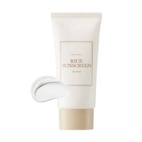 Im From Rice Sunscreen SPF50+ PA++++ in its white tube with metallic cap, standing upright.