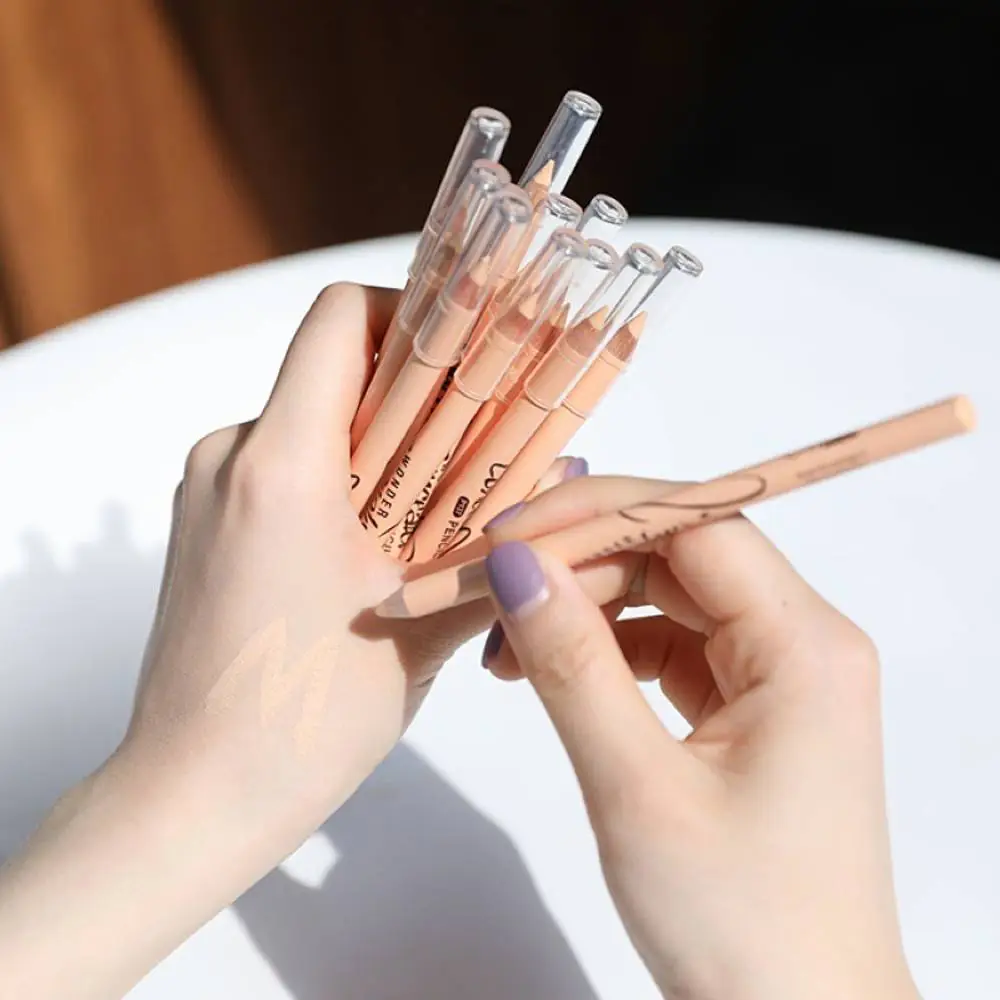 Menow Nude Kajol Wonder Pencil, cap off, revealing soft nude tip, with brand packaging. - thumbnail