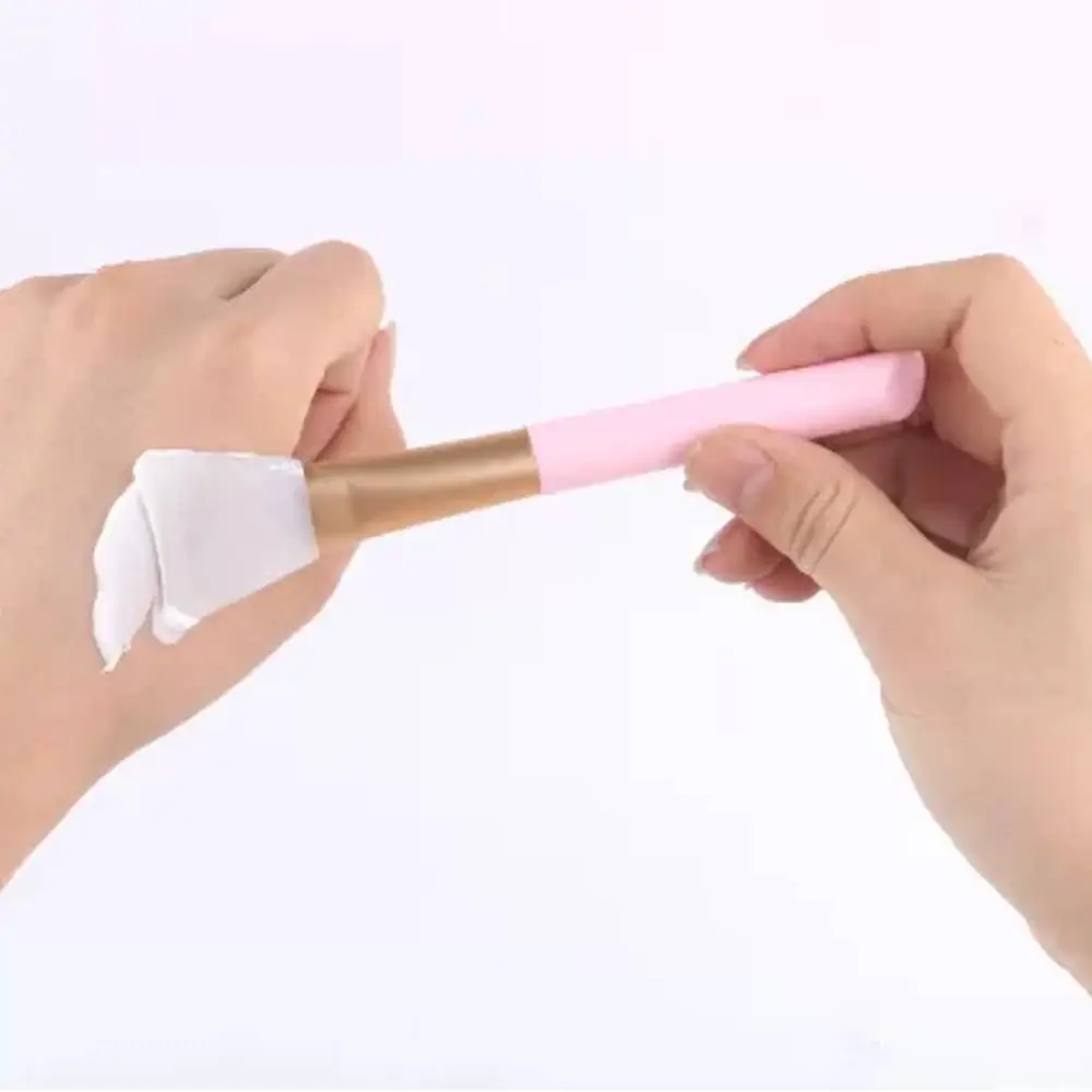 Laikou pink silicone facial mask applicator brush with clear handle, displayed on white background. - thumbnail