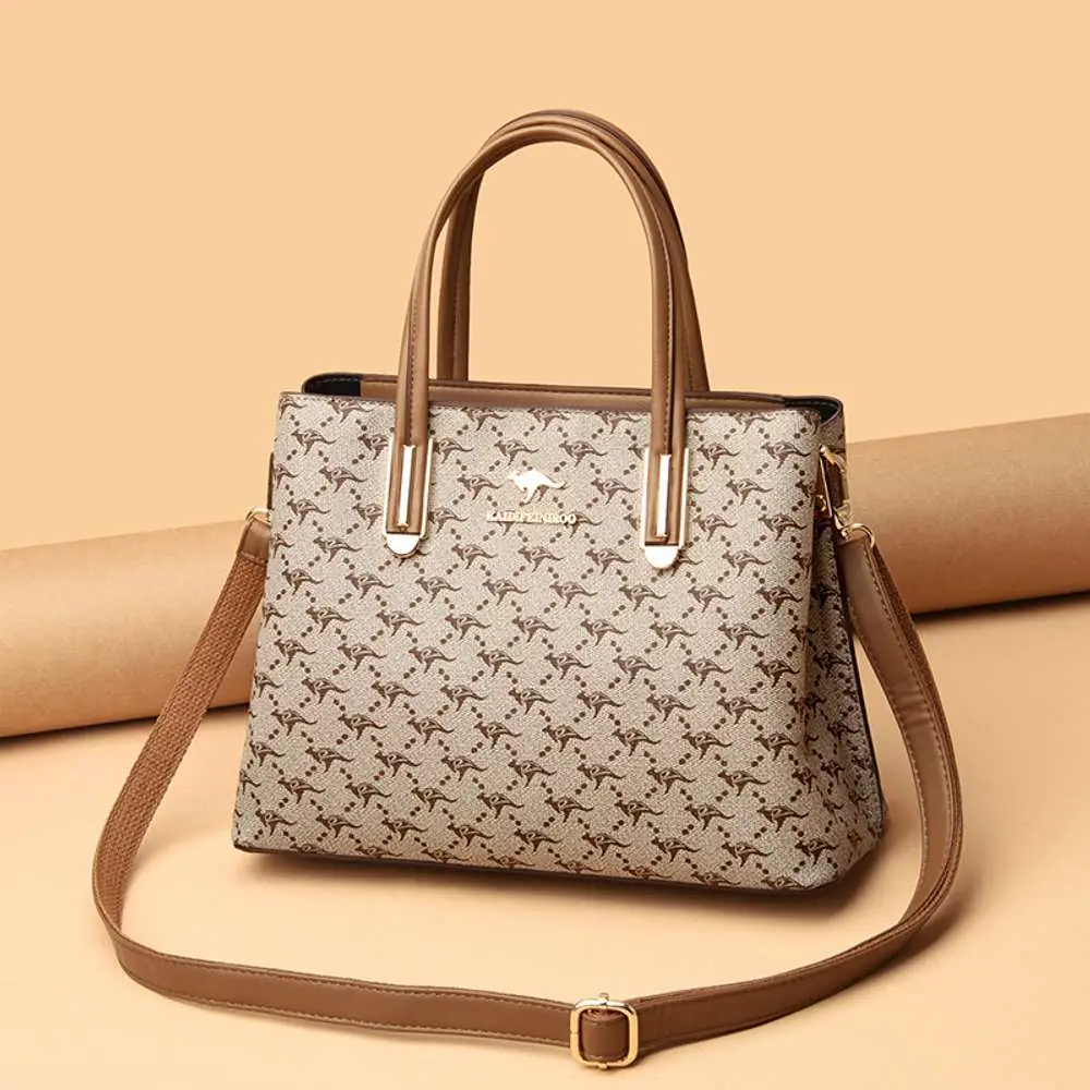 RuSu large-capacity light brown handbag held by a hand, showcasing its relaxed structure and size. - thumbnail