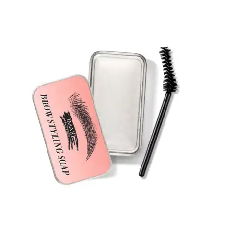 Imagic Brow Styling Soap in clear pot with white lid, alongside a black spoolie brush.