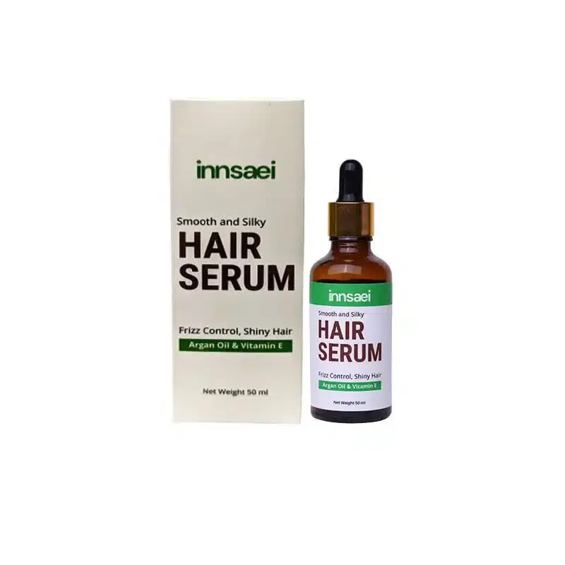 Innsaei Smooth and Silky Hair Serum 50ml in a clear glass bottle with silver pump. - thumbnail